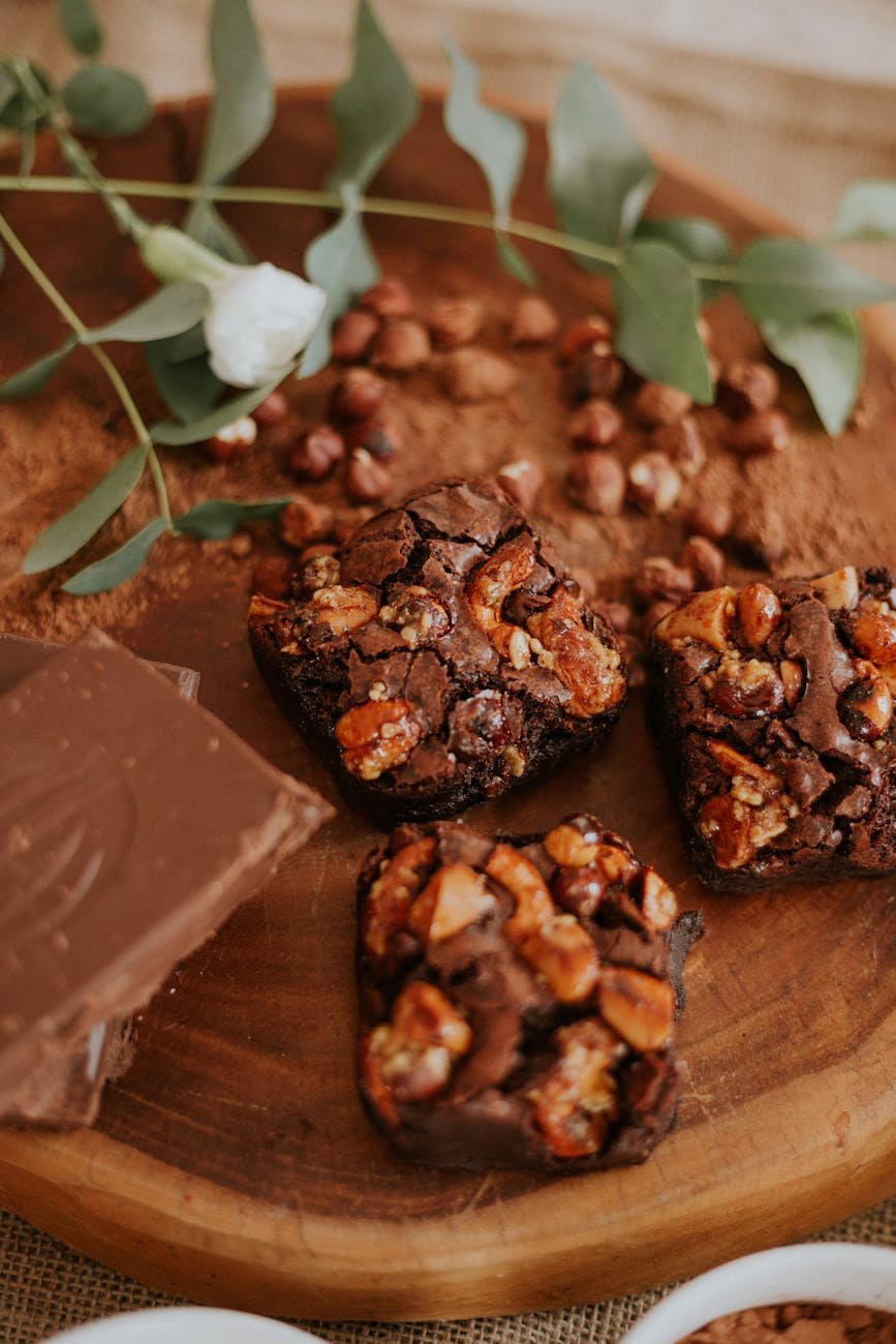 photo of brownies on wooden slab